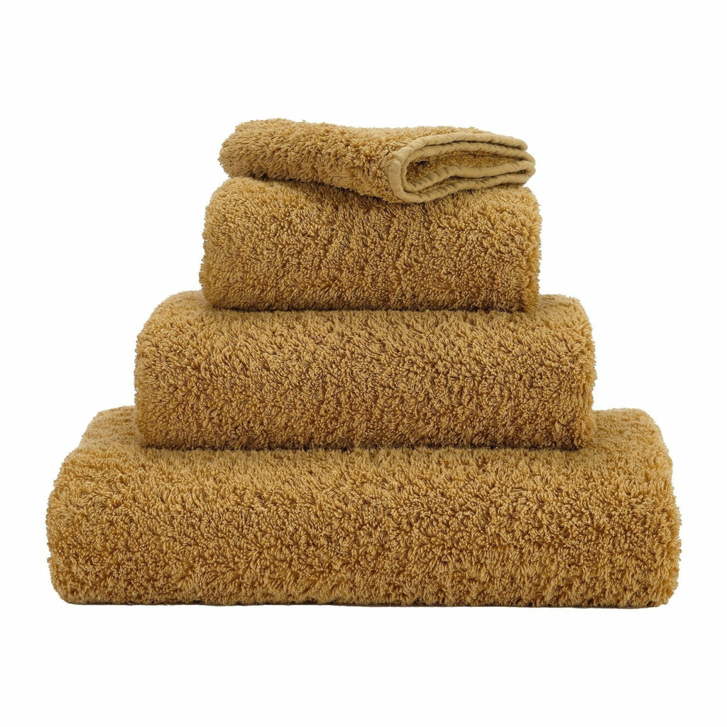 Abyss Super Pile Towels in 840 Gold. Available in Canada @ TMASC.