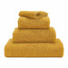 Abyss Super Pile Towels in 840 Gold. Available in Canada @ TMASC.