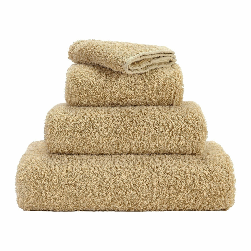 Abyss Super Pile Towels in 714 Sand. Available in Canada @ TMASC.