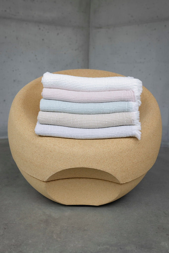 Abyss Bees Towels from top-to-bottom: 100 White, 518 Primrose, 210 Aqua, 770 Linen and 992 Platinum