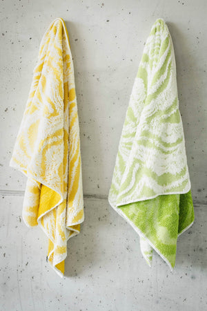 Abyss Fogo Towels. Left: 278 Yuzu, Right: 165 Apple Green