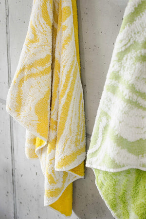 Abyss Fogo Towels. Left: 278 Yuzu, Right: 165 Apple Green