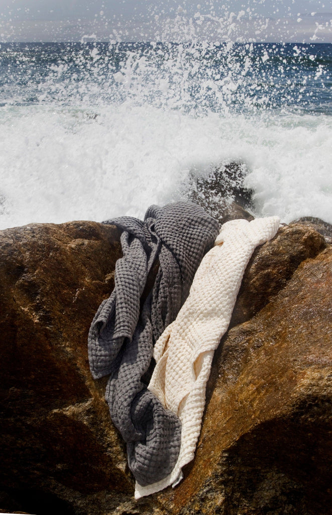 Abyss Pousada Towels in 920 Gris (left) and 103 Ivory (right)