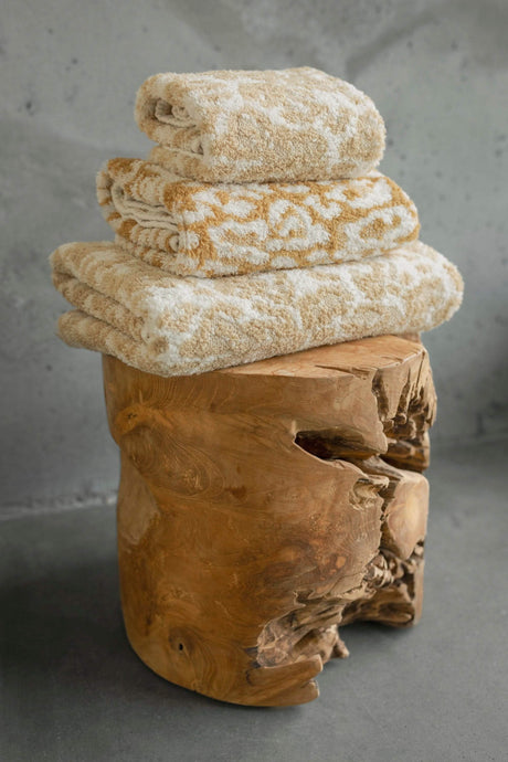 Abyss Sauvage Towels are Available in 714 Sand and 840 Gold