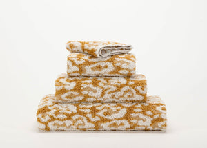 Abyss Sauvage Towels in 840 Gold