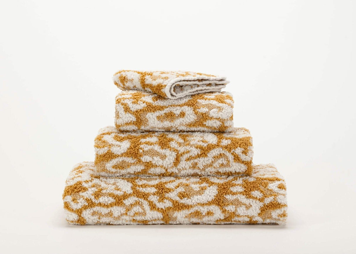 Abyss Sauvage Towels in 840 Gold