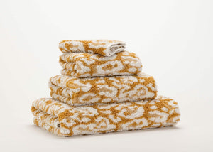 Abyss Sauvage Towels in 840 Gold