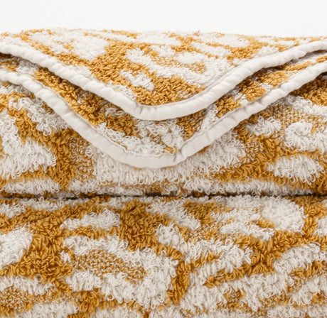 Abyss Sauvage Towels in 840 Gold