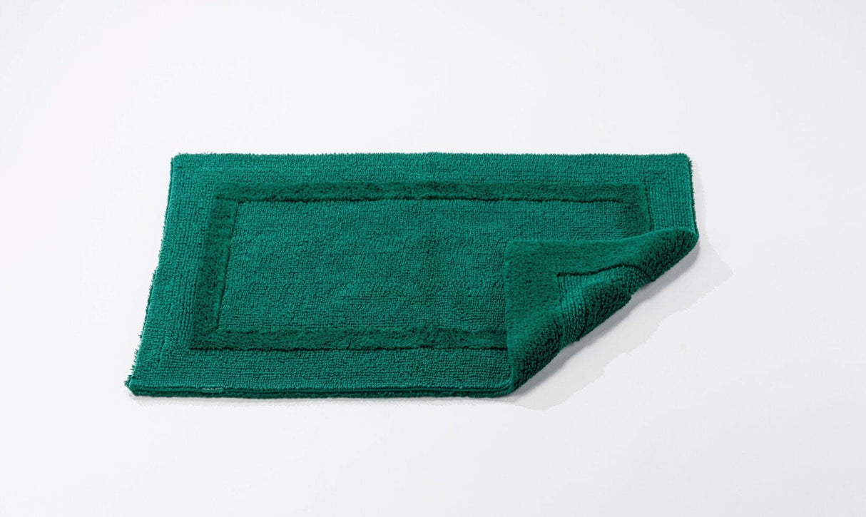 Abyss & Habidecor Reversible Rug in 298 British Green. Available in Canada @ TMASC.