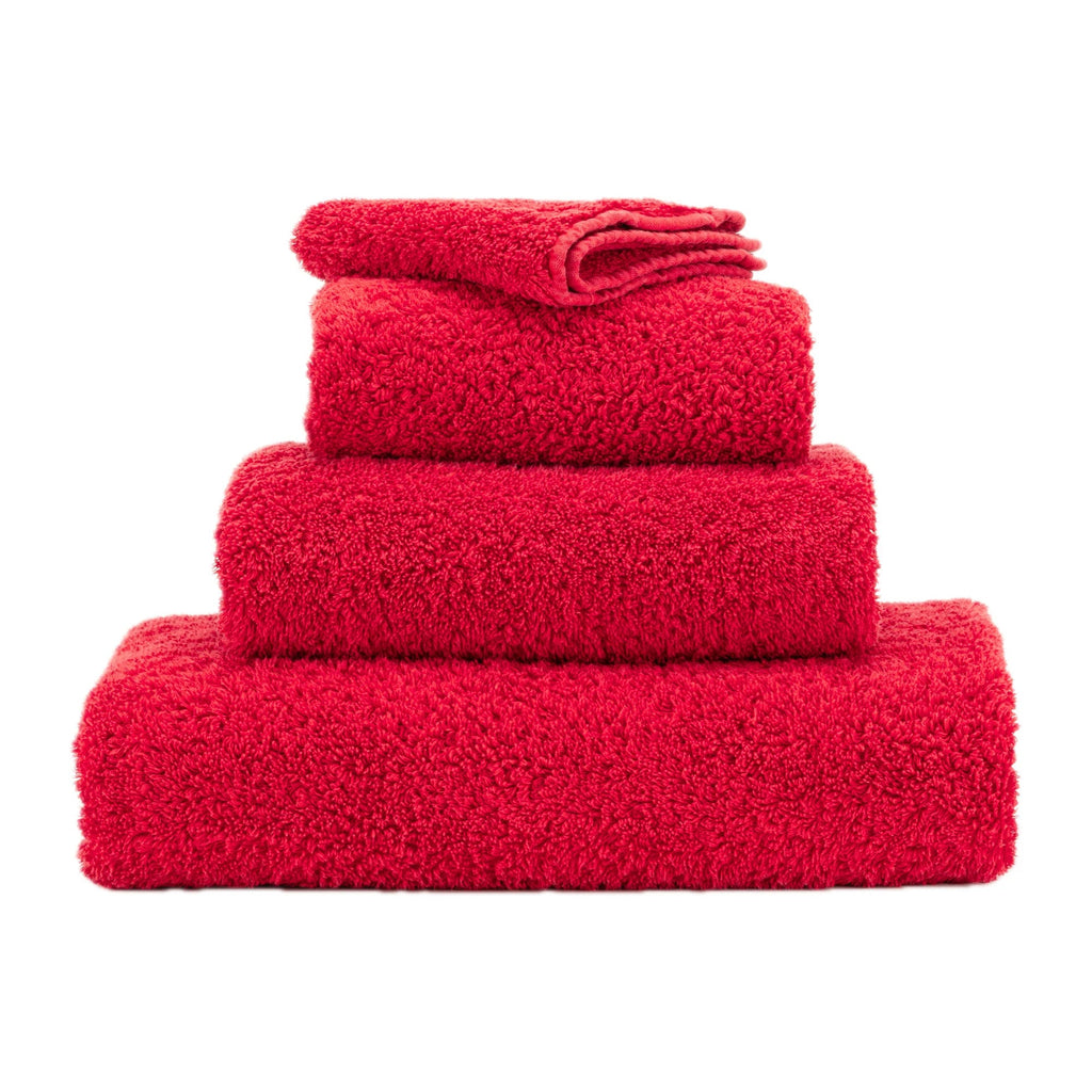 Abyss Super Pile Towels in 564 Carmin. Available in Canada @ TMASC.