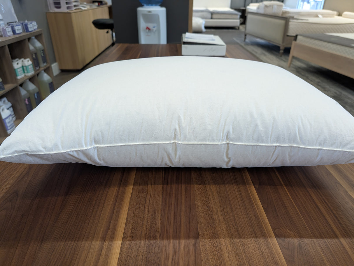 St Geneve Maple Creek pillow in queen size, Medium fill. Shown in our Sherwood Park store on a TEAM 7 Magnum dining table