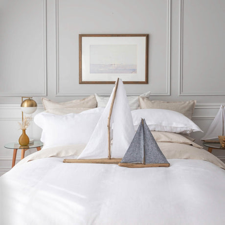 Nicola Optical White (front/duvet cover/tall sailboat), iron (short sailboat), Linen (flat sheet, pillowcases, shams L/R)